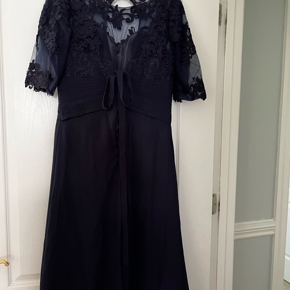 Brand new never worn. Beautiful dress that laces up the back. - Picture 2 of 2